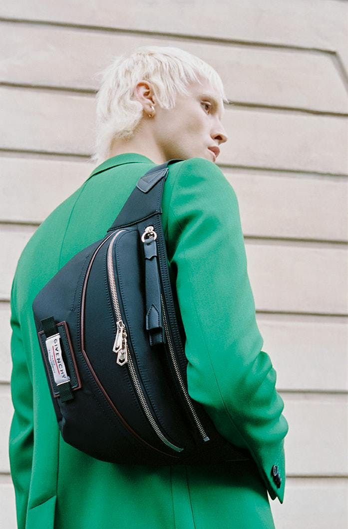 bag accessories handbag person blonde purse backpack face coat jacket