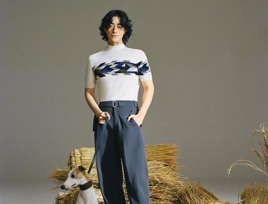 pants nature outdoors straw adult female person woman dog blouse