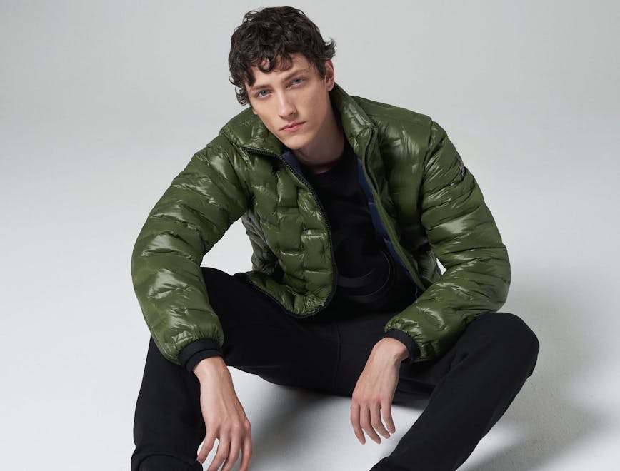 clothing coat jacket boy male person teen blazer sitting