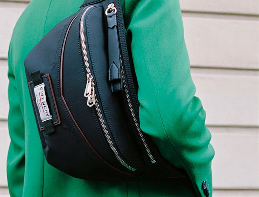 bag accessories handbag person blonde purse backpack face coat jacket