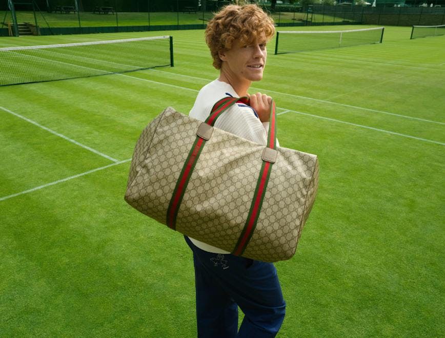 accessories bag handbag grass boy child male person purse field