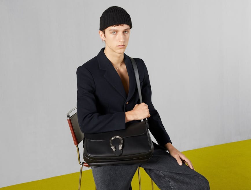 accessories bag handbag blazer coat jacket purse formal wear suit sitting