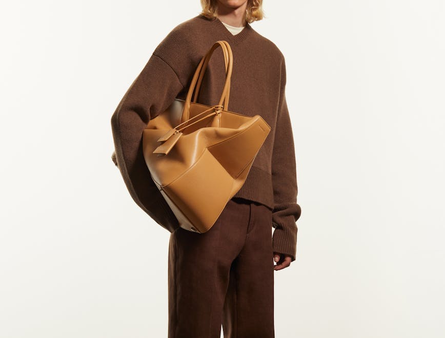 bag handbag adult male man person long sleeve purse formal wear fashion