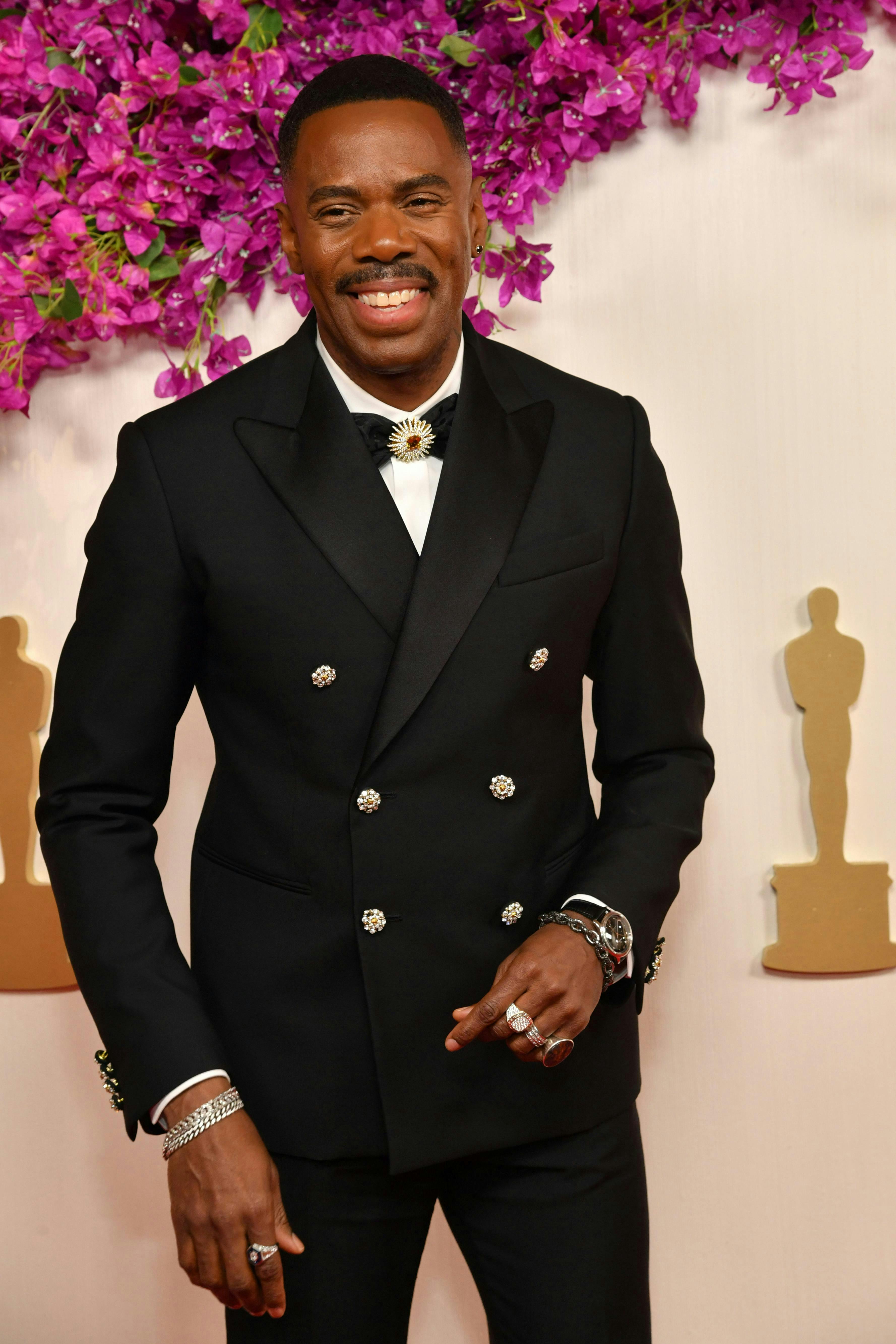hollywood formal wear suit head person face bracelet smile adult male man